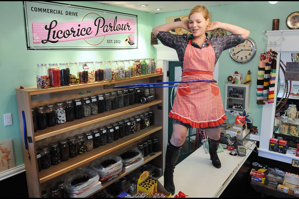 Commercial Drive Licorice Parlour owner Watermelon shows off her hula hoop skills.