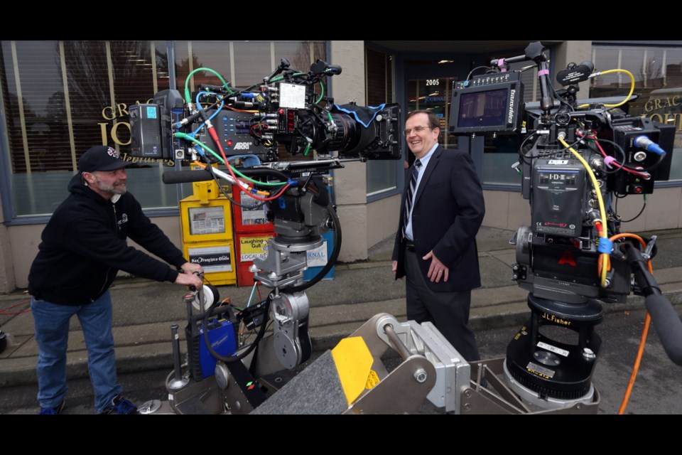 Oak Bay Mayor Nils Jensen checks out some of the equipment on the set of Gracepoint during filming in his municipality in 2014.