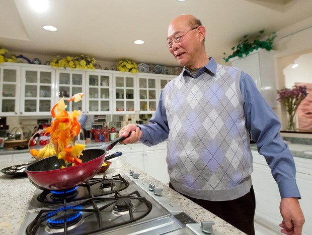 Local actor and chef, Colin Foo, whips up a dish full of red and gold to bring good luck in the Year of the Horse.