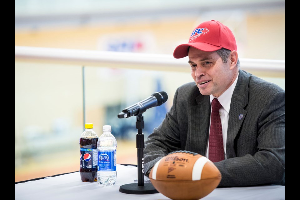 Jacques Chapdelaine talks to the press following the announcement as head coach of the Simon Fraser University varsity football program on Tuesday