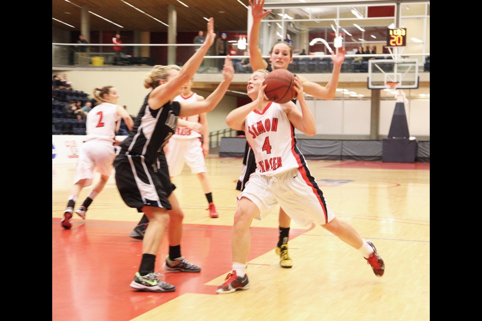02-01-2014 SFU (white) vs. Montana State - Billings in Great Northwest Conference regular season basketball at SFU. photo Jason Lang
