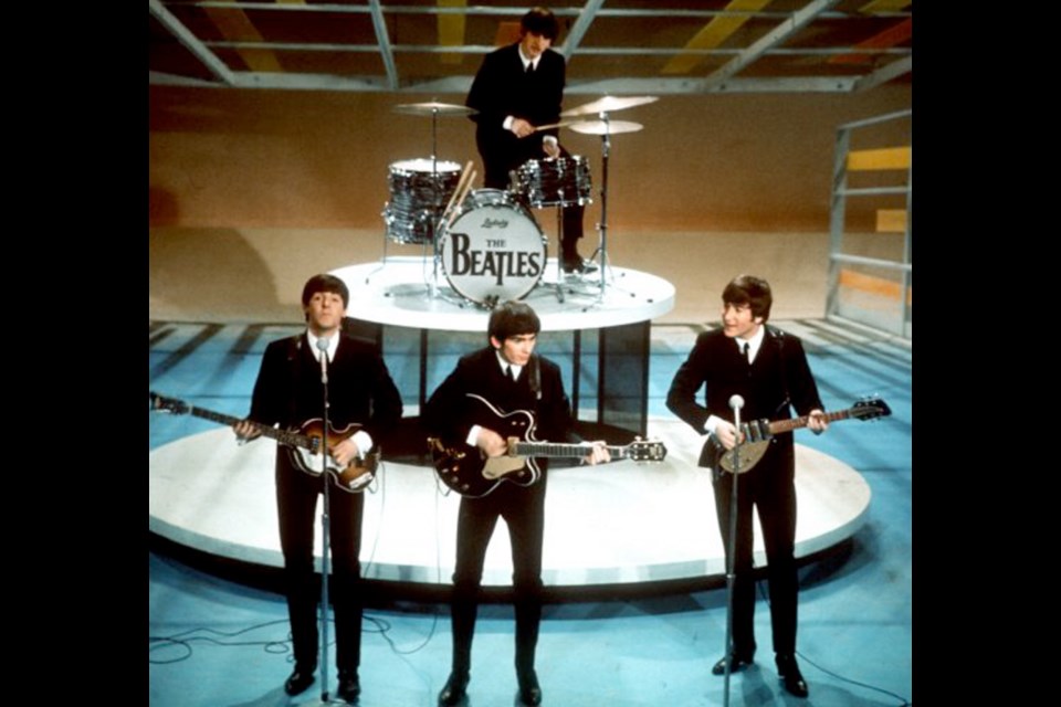 The Beatles perform live on the Ed Sullivan Show in New York in 1964.