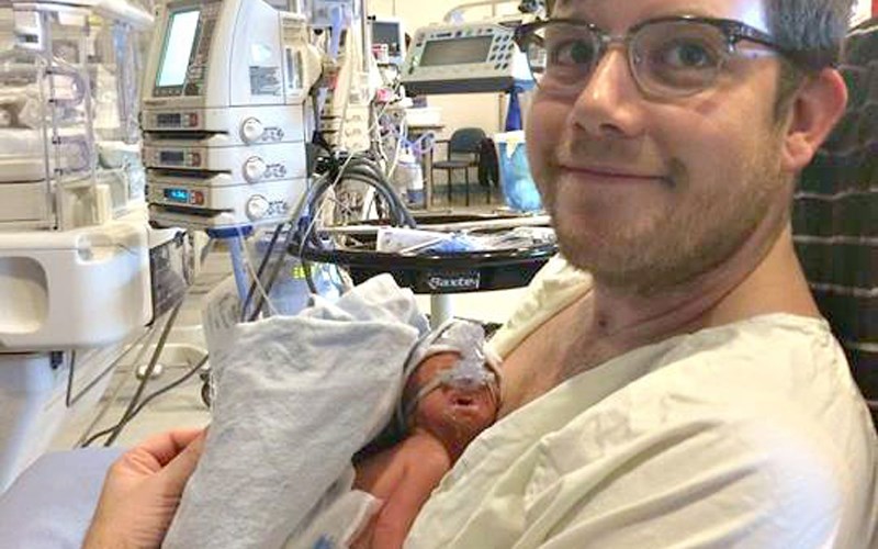 Dylan Benson with newborn son Iver.