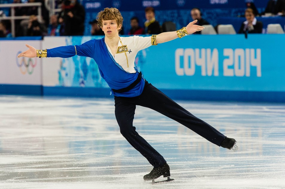 North Vancouver-born Kevin Reynolds shines for Canada in the team figure skating competition at the Sochi Olympics Sunday. The Canadians earned silver behind the host Russians.