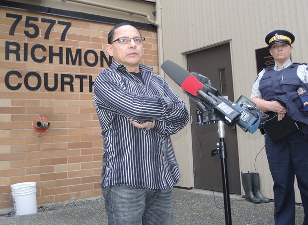 Juan Carlos Quijano-Flores' father, Carlos Quijano, stands outside Richmond Provincial Court two weeks ago, when Alvarez was expected to be sentenced.