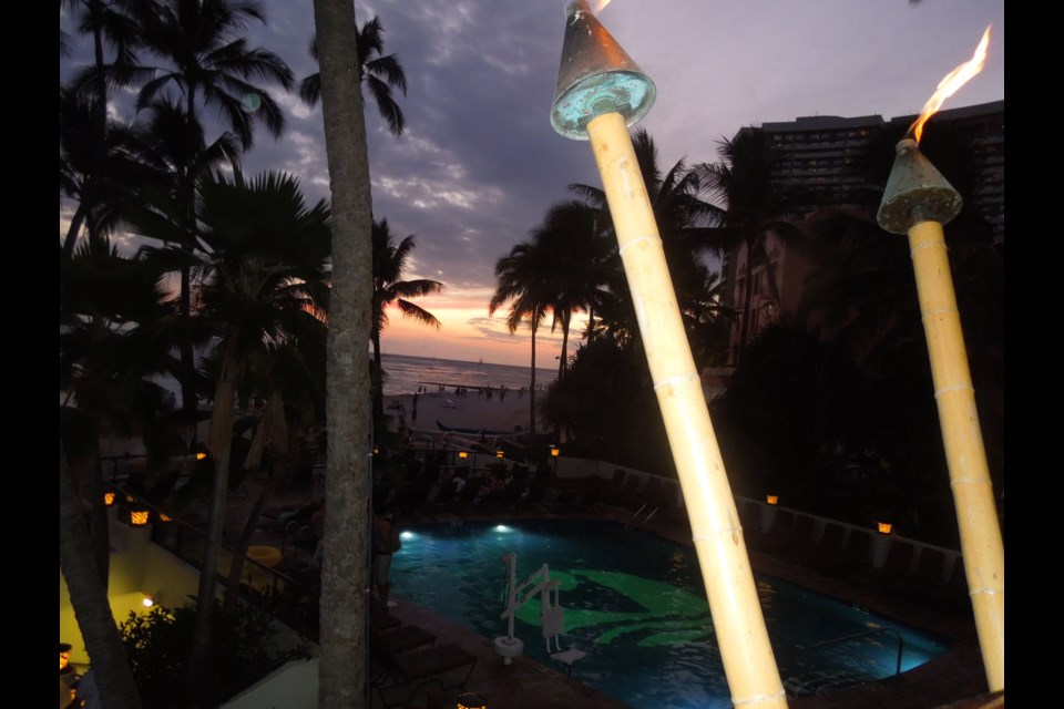 Sunset from the Hula Grill located in the Outrigger Waikiki on the Beach. photo Sandra Thomas