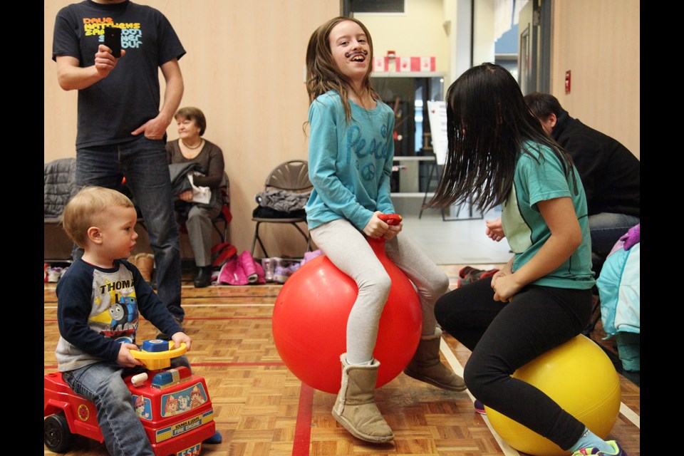 02-10-2014 Brooke MacLeod bouncing at the Queensborough Community Centre family day event. photo Jason Lang