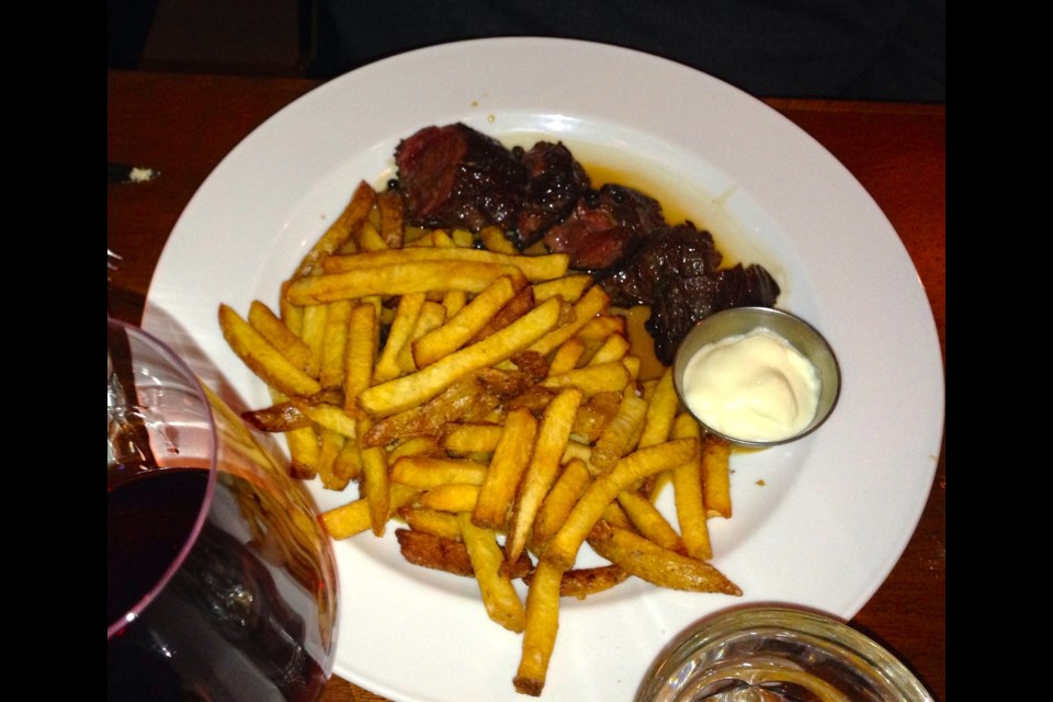Bistro Wagon Rouge serves up French classics such as steak frites in cozy East Side confines.