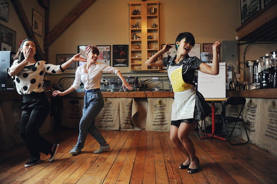 Pop-up dances were part of the ninth annual Winterruption festival on Granville Island this past weekend. The first stop on the tour was at Origins Coffee where, from left to right, Kim Sato, Natasha Gorrie, and Kim Sato, and Dianna David broke out into their ‘Neighbourhood Watch’ dance. Photo by: Rebecca Blissett