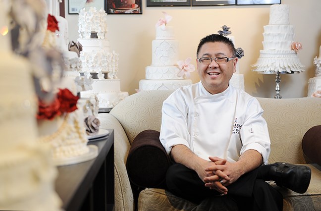 Peter Fong sits among his delectable creations at Ganache Patisserie.