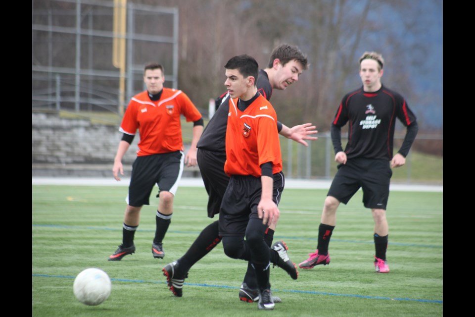02-15-2014
(orange) Cliff Ave United vs. North Van Wild. u17 silver 1 league.
photo Jason Lang