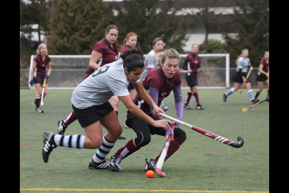 02-15-2014
Burnaby Lakers (grey) vs. West Van, div 3 womens field hockey.
photo Jason Lang