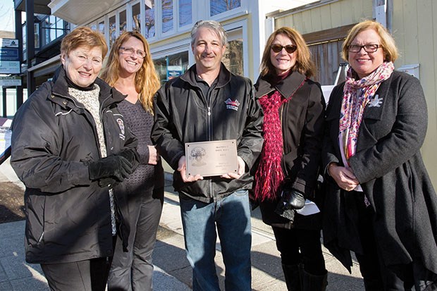 Mayor Lois Jackson (left) and councillors Sylvia Bishop (right) and Jeannie Kanakos (second from right) presented a Heritage Award of Merit to Linda Park and Pierre Bonato Wednesday for the restoration of the former McCrea’s Pool Hall on Delta Street.