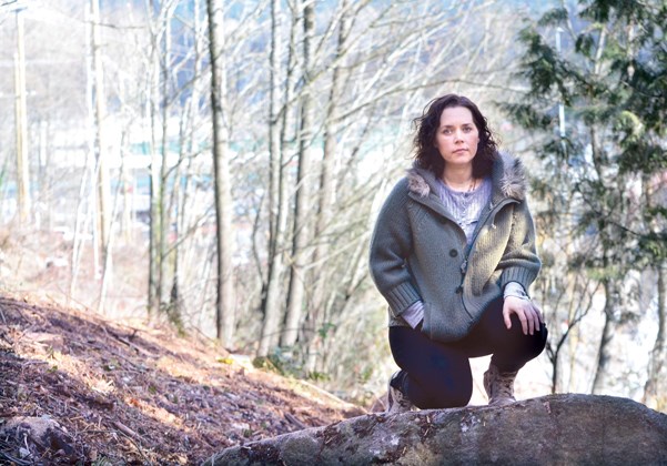 Melanie Ptashynski visits the site where trees were recently cleared for a section of the Spirit Trail.