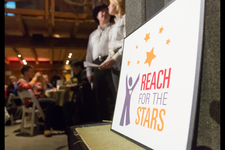 The Reach Child and Youth Development Foundation, which offers support and services for children with special needs, held its second annual Reach for the Stars fundraising gala at Harris Barn in Ladner Saturday night. Proceeds from the event will go toward Reach's Building for Children Together $4 million capital campaign to build a new centre in Ladner for children and youth with special needs. So far, Reach has raised $1.3 million in total.