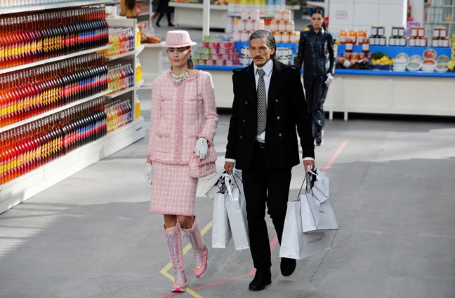 A model wears a creation for Chanel's ready to wear fall/winter 2014-2015 fashion collection presented in Paris, Tuesday, March 4, 2014. (AP Photo/Jacques Brinon)