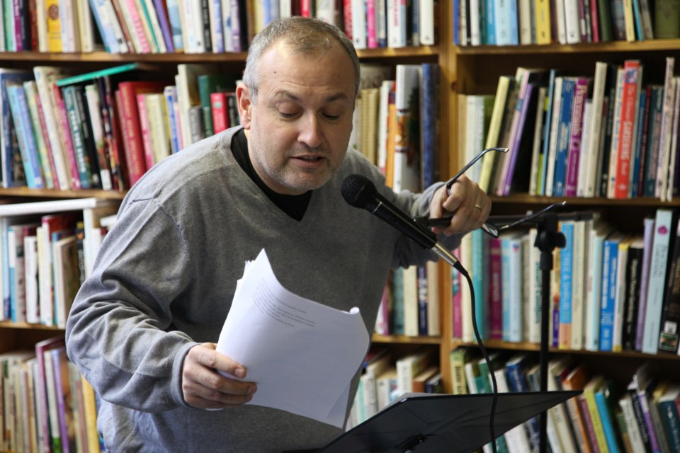 Alan Hill reads at the Poetic Justice session March 2 at Renaissance Bookstore.