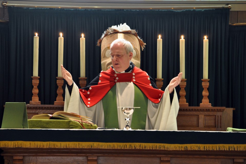 The Reverend Michael Batten celebrating Holy Communion at the final scheduled Sunday service at St. David of Wales Anglican church on Feb. 23. Photo Randy Murray