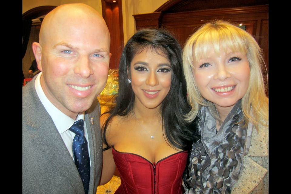 Financial advisor Shalini Kumar modelled a 1ct. diamond pendant (valued at $3,700) donated by Birks’ Russell Jones (left) and Yvonne Zawadzki to the Canadian Diabetes Association’s Baubles and Banting benefit.