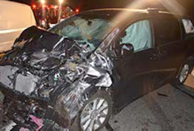 The scene of an accident on the Upper Levels Highway where a panel van driver went the wrong direction on the highway and got into a head-on with a minivan.