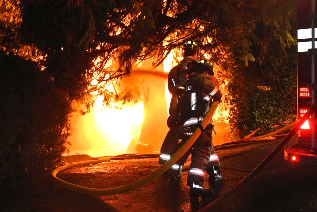 Firefighters attack a blaze on Ottawa Avenue in West Vancouver.