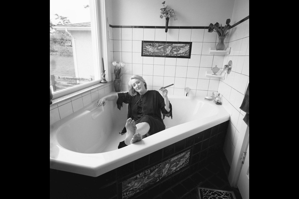 Poet Linda Rogers was photographed in her bathtub.