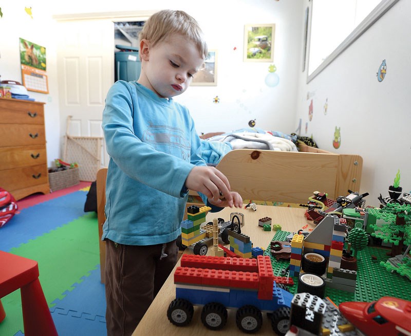 Noah playing with lego