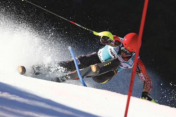 West Vancouver native Mike Janyk carves a tight line during a recent World Cup slalom race. The Three-time Olympian will retire at the end of this season following this week's national championships in Whistler and a race on grouse Mountain March 31.