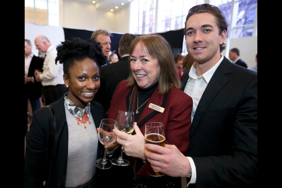 Thandi Pilkey of The Commissionaires, left; Saskia Elias, Times Colonist; and Justin Erikson of Trail Appliances.