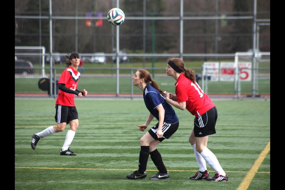 03-30-2014
(blue) New West vs. Westside, bronze championship, metro women's soccer.
photo Jason Lang