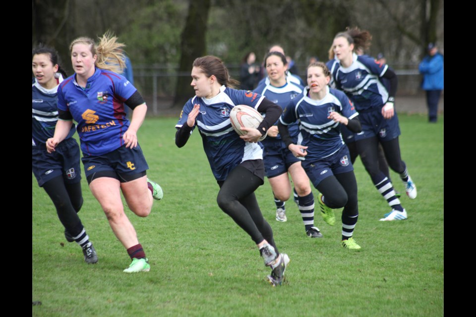 03-29-2014
Burnaby Lake rugby club (dark blue) vs. United Rugby club, Hume Park.
photo Jason Lang