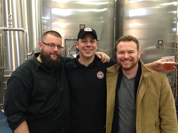 Vancouver Craft Beer Week co-founder Chris Bjerrisgaard, Red Truck Brewing's Sam Payne and Chris Brandt, director of Music Heals, celebrate VCBW Brew Day at Central City Brewing in Surrey March 28.