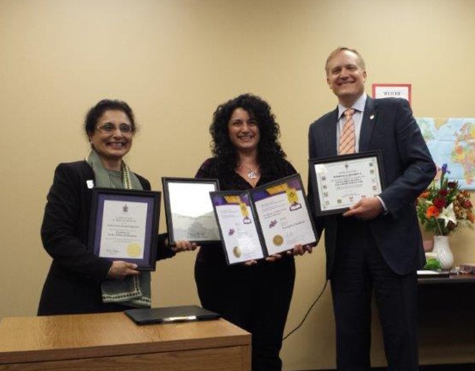 Rosangela Giacobetti (centre) with school board chair Baljinder Narang and Burnaby-New Westminster MP Peter Julian. Giacobetti was presented with a Prime Minister's Award for excellence in early childhood education.