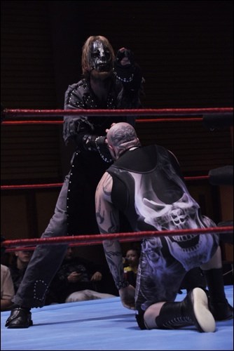 The Cremator applies a choke hold to Cody "TKO" Smith during ASW action at Totem Hall on Friday (April 11).
