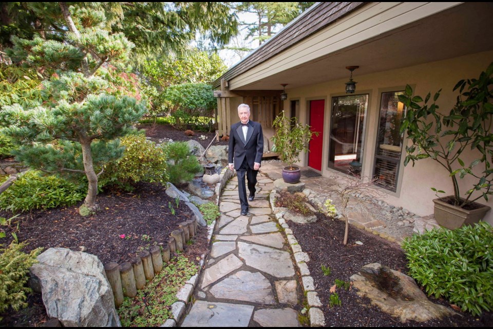 Pacific Opera Victoria chairman David Flaherty is seen heading out to a recent black tie fundraising event, via his stylishly simple Japanese garden.