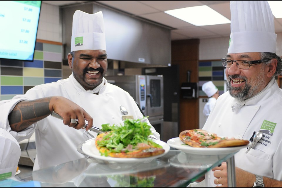 VCC’s new cafeteria Quizine, Chef JC Felicella and student Titus Joseph (L) in the Culinary Arts program. Photo Dan Toulgoet