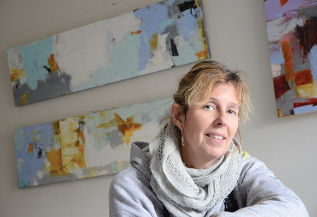 Abstract painter Nicola Morgan displays some of her oil and cold-wax infused pieces.