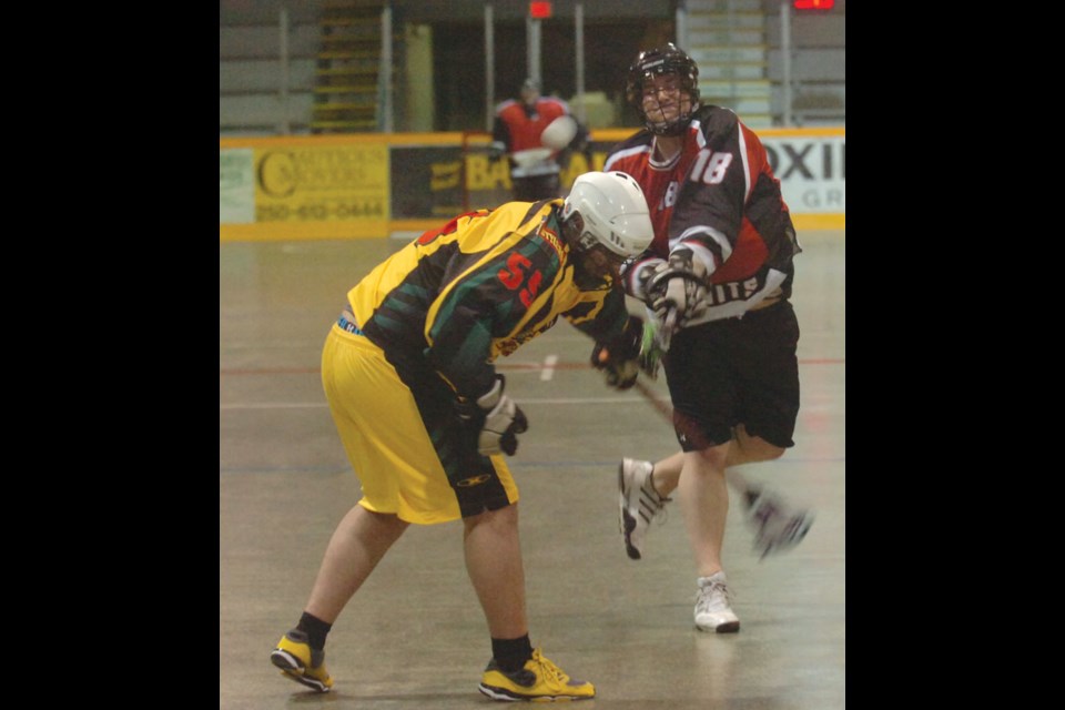 Josh Sidhu of the BX Pub Bandits fires a shot over Mike Quarin, of the Cowboy Ranch Regional Security Stylers.