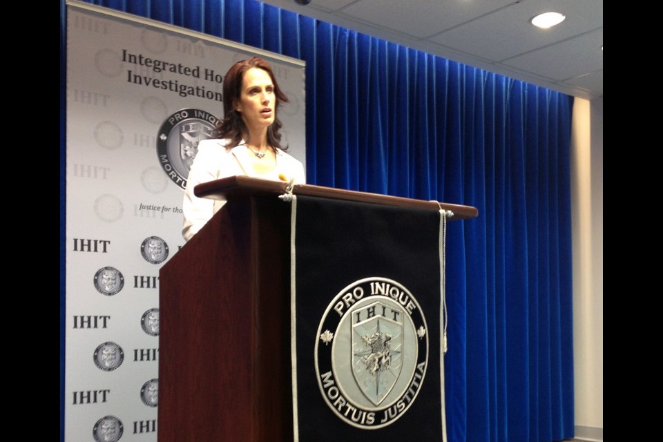 Sgt. Jennifer Pound announces charges in the December murder of a Burnaby woman at a press conference on Monday morning.