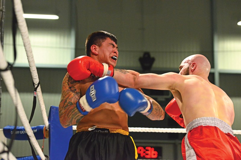 Sechelt’s Marcus Baptiste, left, lost a close decision to Aaron McKitrick of Kelowna in the main event of War on the Shore 2 last Saturday night at the Gibsons and Area Community Centre.