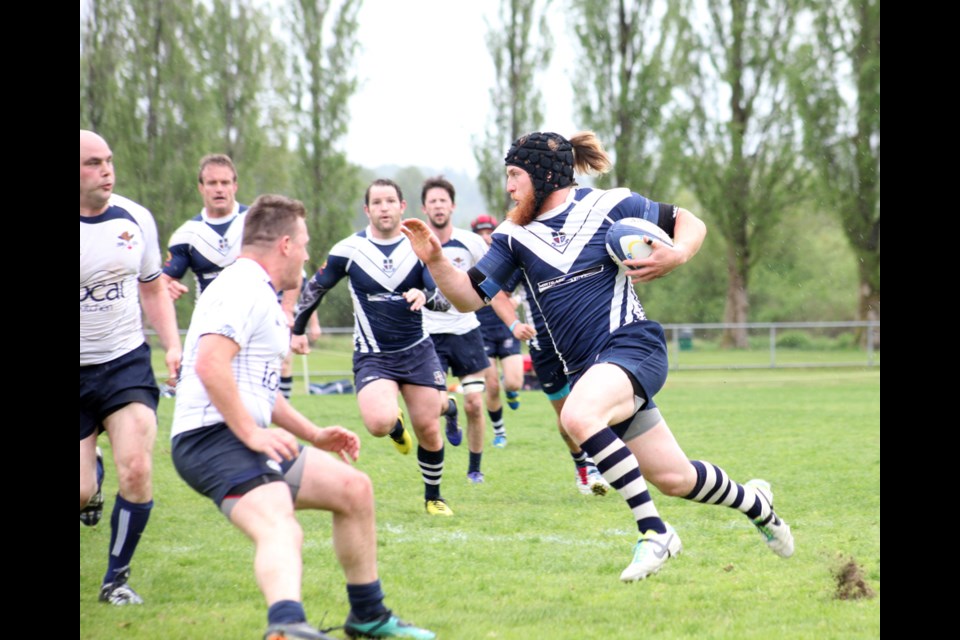 05-03-2014
(blue) Bby Lake div 1 men vs James Bay.
photo Jason Lang