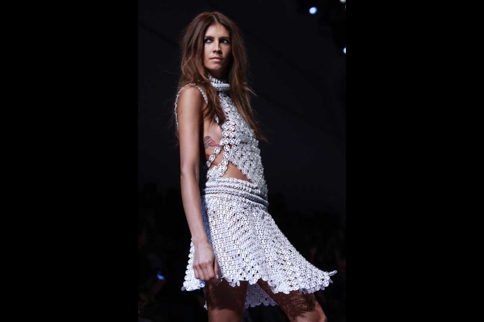 A model wears a creation for Paco Rabanne's ready to wear Spring-Summer 2013 collection, presented in Paris,Tuesday, Oct.2, 2012. (AP Photo/Thibault Camus)