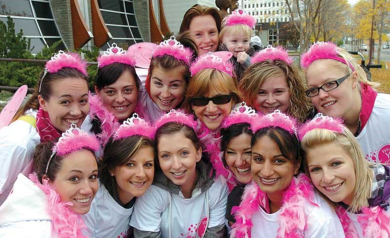 The Tooth Fairies dental hygienists and students are cheek to cheek in pink for the CIBC Run for the Cure at the Prince George Civic Centre Sunday. Over 400 participants gathered to brighten up the dreary day.