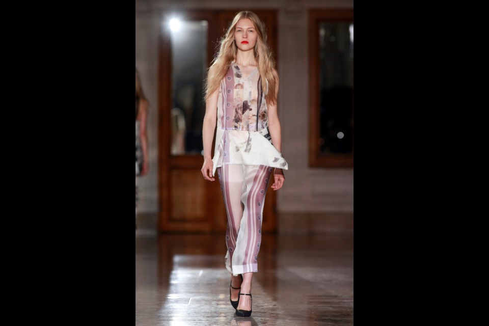 A model shows a creation by Irish fashion designer Sharon Wauchob as part of her ready to wear Spring-Summer 2013 collection, presented in Paris, Thursday, Sept. 27, 2012. (AP Photo/Thibault Camus)