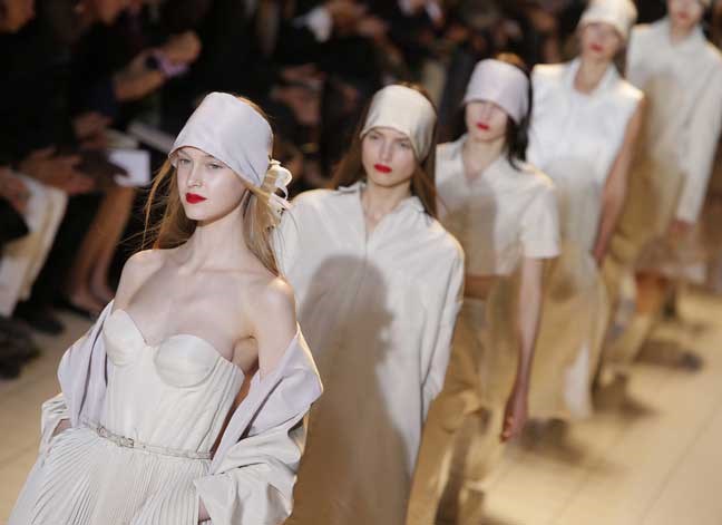 A model wears a creation as part of fashion designer Marco Zanini for Rochas' spring-summer 2013 ready to wear collection in Paris, Wednesday, Sept. 26, 2012. (AP Photo/Francois Mori)