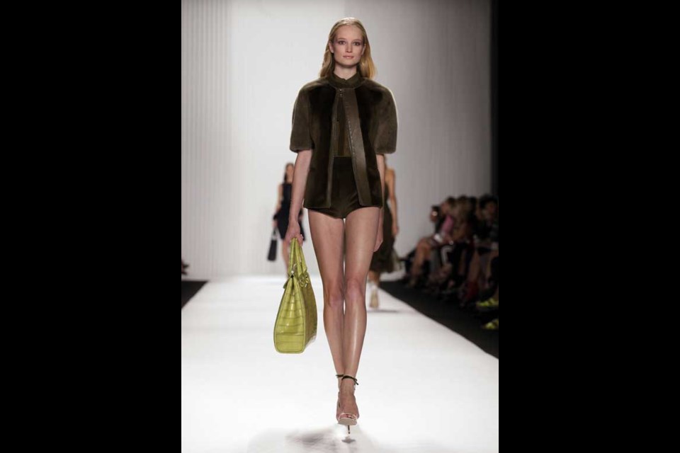 The J. Mendel Spring 2013 collection is modeled during Fashion Week in New York, Wednesday, Sept. 12, 2012. (AP Photo/Richard Drew)