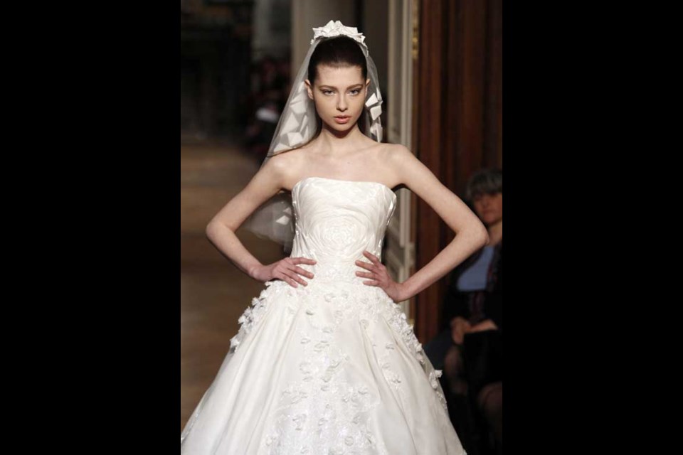 A model wears a creation for Tony Ward's Spring-Summer 2014 Haute Couture fashion collection presented in Paris, Monday, Jan.20, 2014. (AP Photo/Thibault Camus)