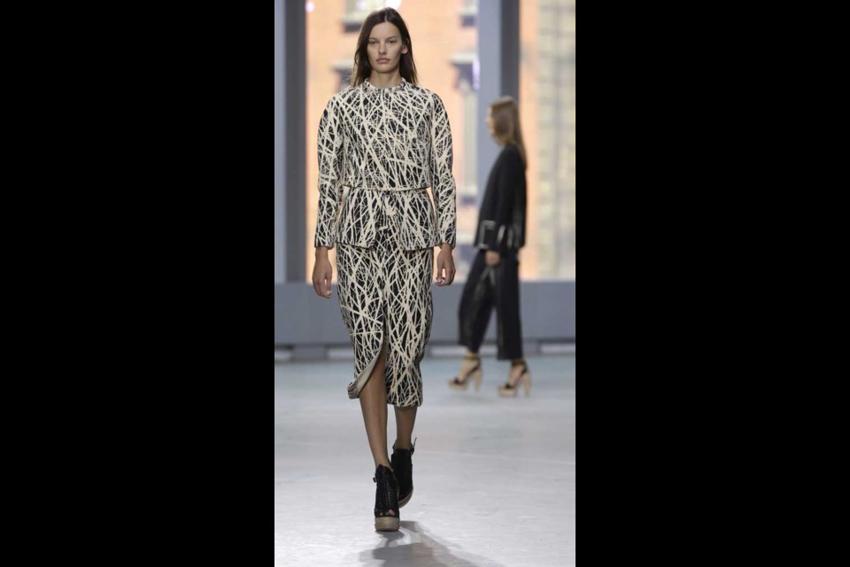 The Proenza Schouler Spring 2014 collection is modeled during Fashion Week in New York, Wednesday, Sept. 11, 2013. (AP Photo/Seth Wenig)