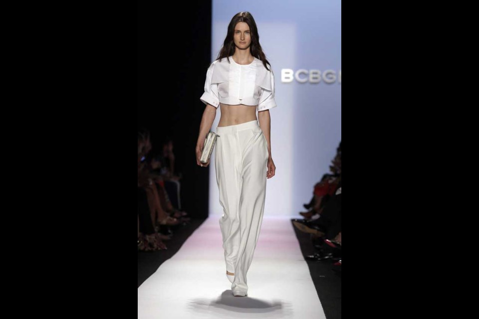 The BCBG MAX AZRIA Spring 2014 collection is modeled during Fashion Week in New York, Thursday, Sept. 5, 2013. (AP Photo/Richard Drew)
