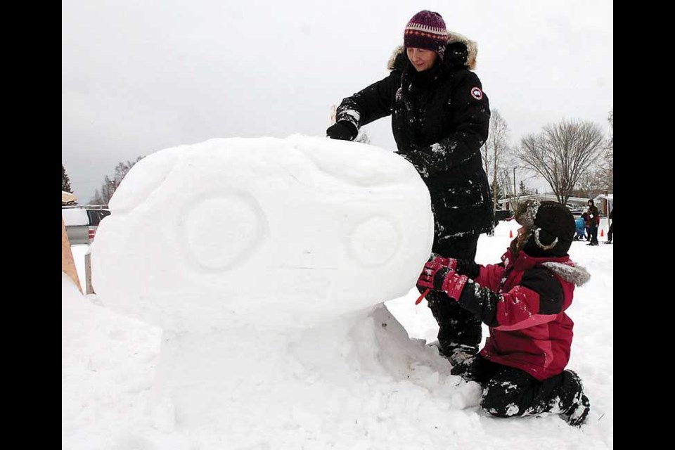 Caroline Lavoie and her daughter Rafaele, 7, had the biggest mushroom in the snow sculpture contest.
Jan 30, 2012
Citizen photo by David Mah